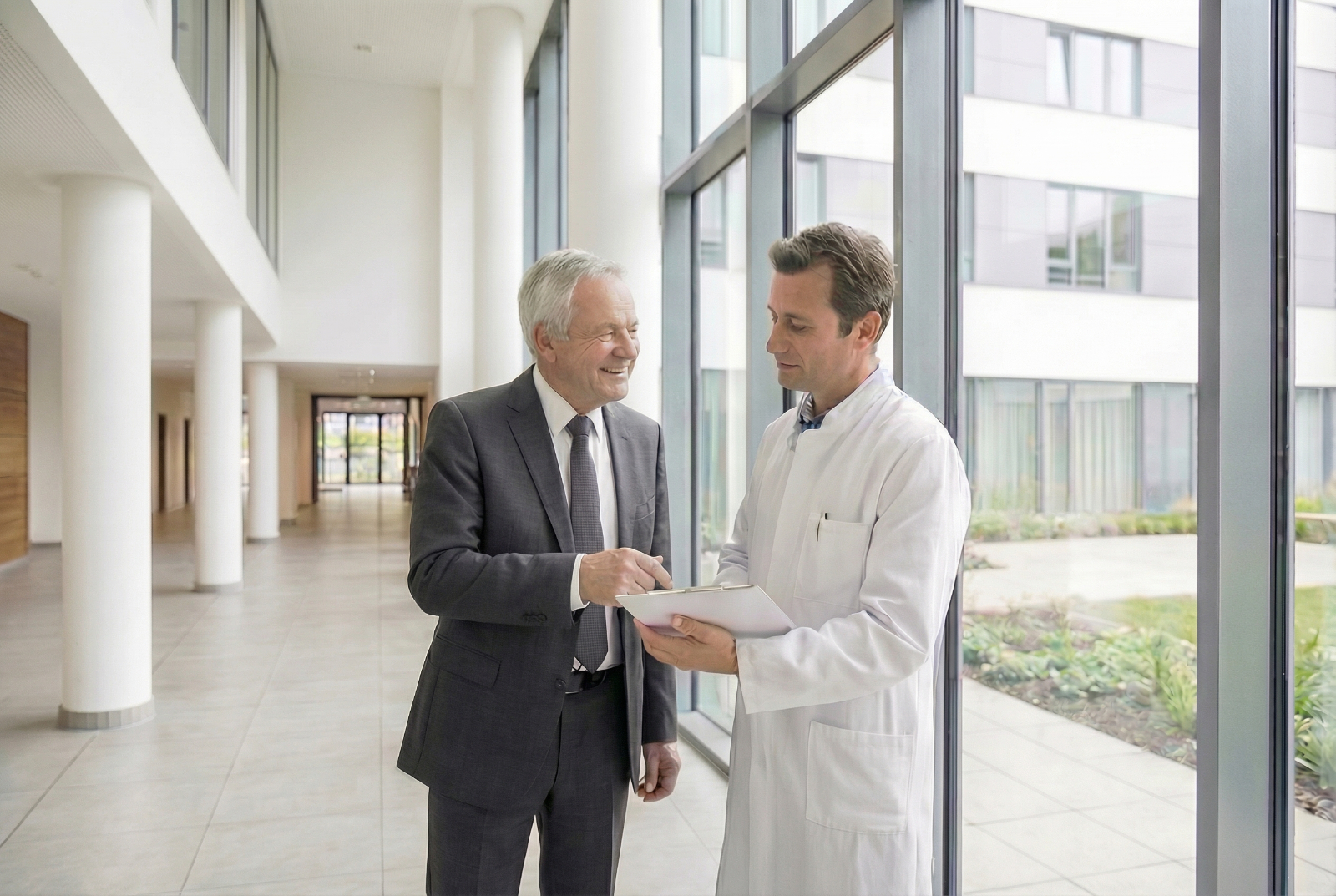 Medical practice broker reviewing valuation and sales strategy with a physician client.